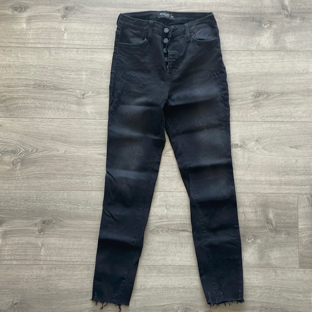 Black skinny Jean with distressed bottom